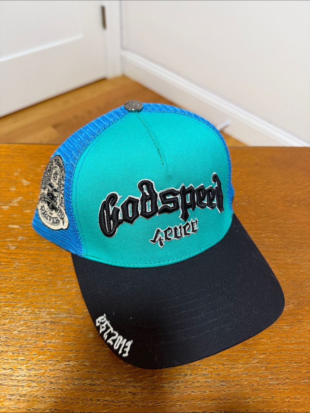 Reverb Teal and Black Mesh Trucker Hat